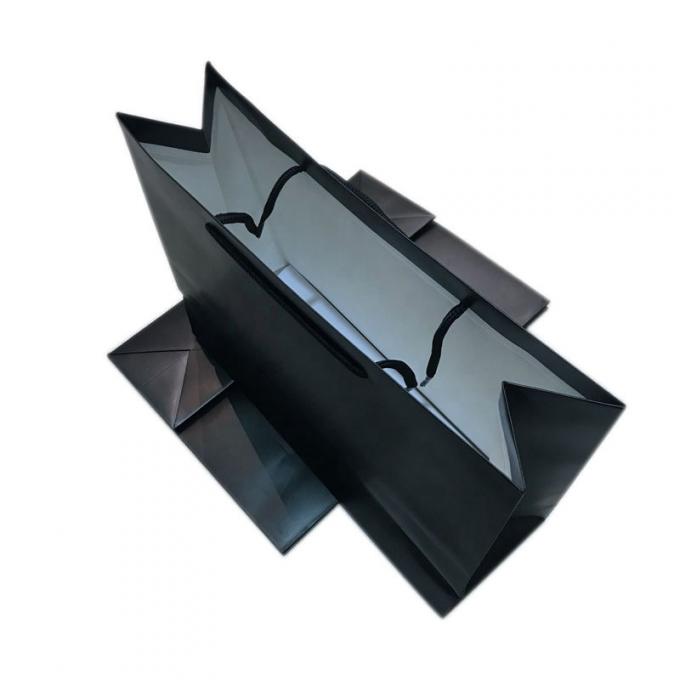 CMYK বুটিক নাইলন পেপার হ্যান্ডেল শপিং ব্যাগ OEM ODM 0